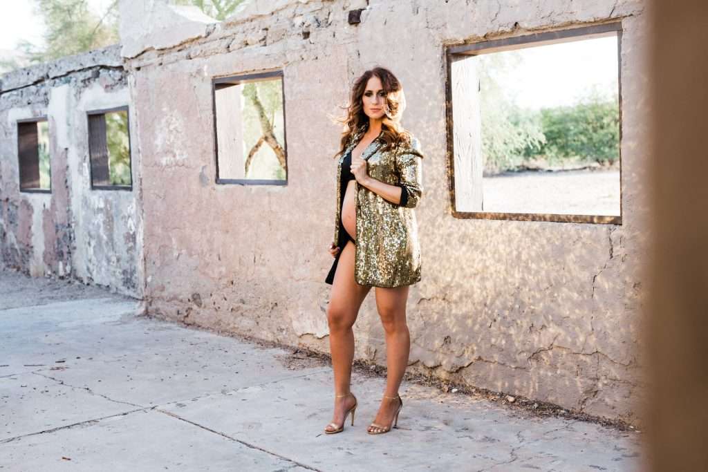 A Photographer capturing a woman in front of a building in Phoenix, Arizona.