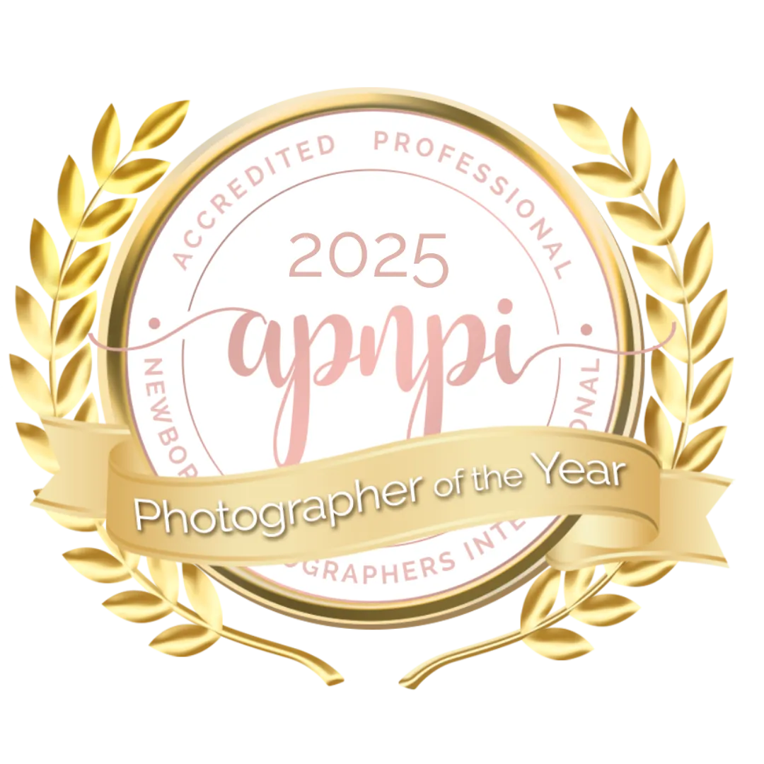 Gold laurel wreath badge with "APNPI 2025 Photographer of the Year" and "Accredited Professional Newborn Photographers International"—perfect for any award-winning Family Photographer Phoenix.